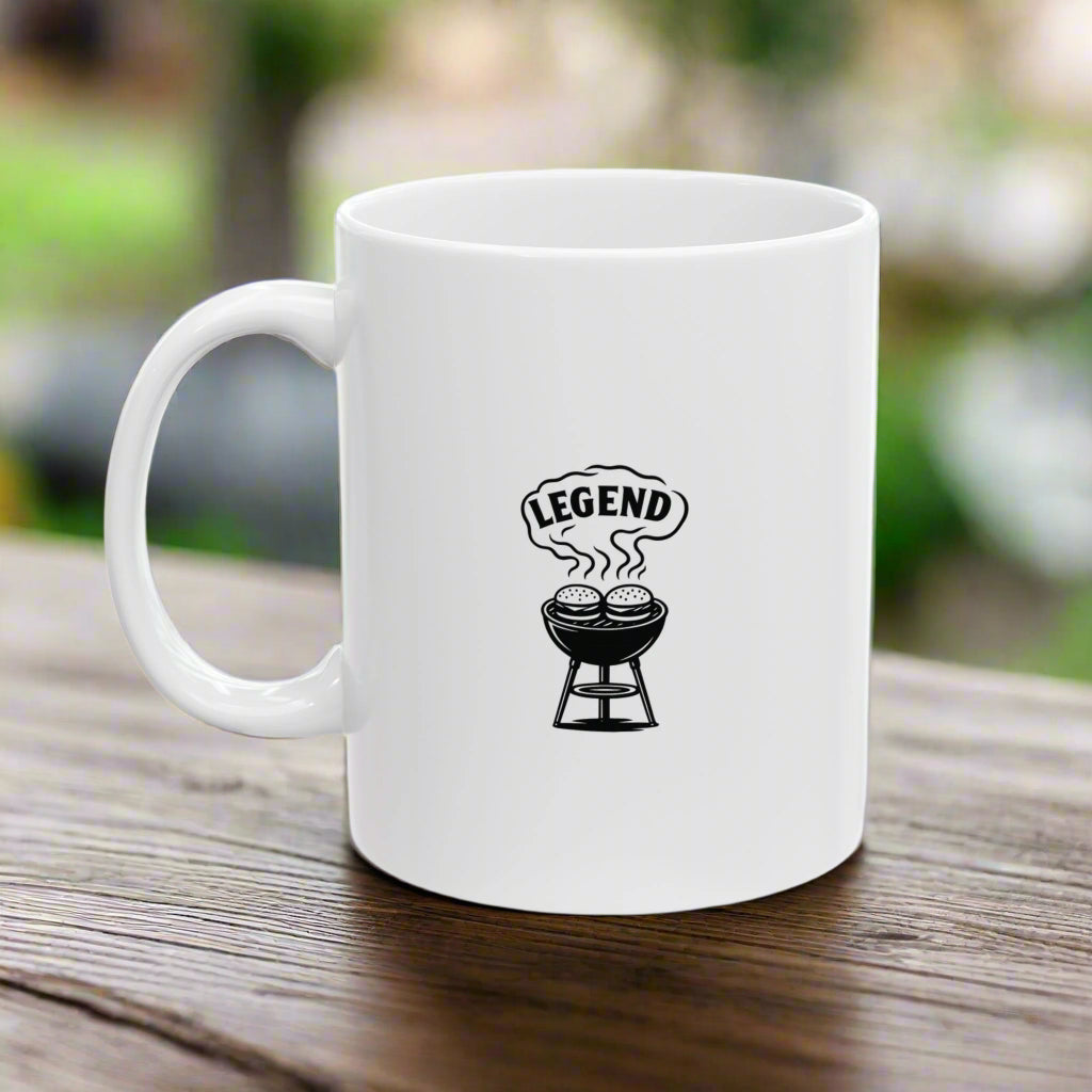 White mug with a black grill and 'Legend' design on a white background