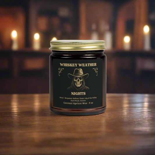 Whiskey Weather Nights candle jar with a gold lid 